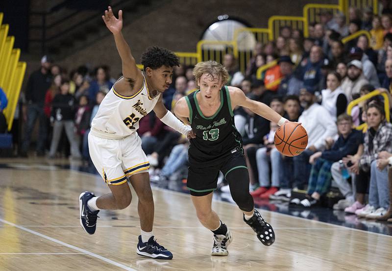 Rock Falls’ Aydan Goff looks to drive around Sterling’s Kaedon Phillips Tuesday, Nov. 29, 2022.