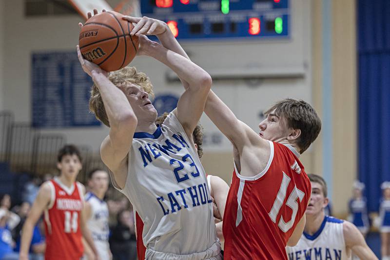 Newman’s Lucas Simpson puts up a shot against Morrison’s Asher Ernst Wednesday, Jan. 3, 2024 at Newman High School.