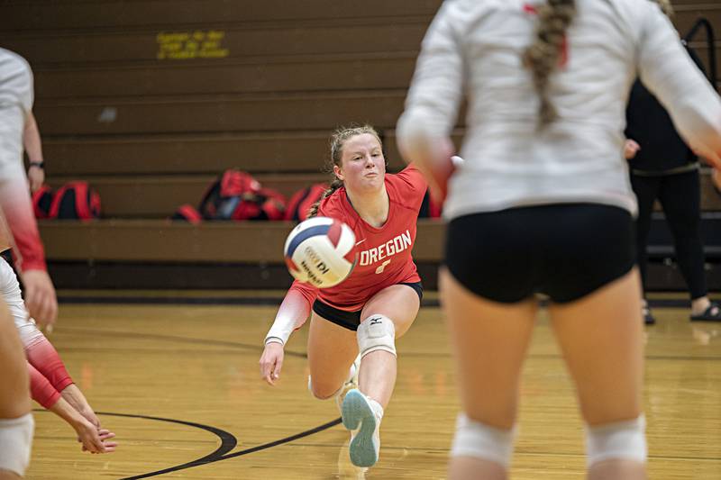 Oregon’s Madison Shaffer lunges for a shot against Rock Falls Tuesday, Oct. 24, 2023 at the Riverdale volleyball regional.