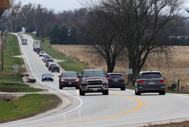 Vehicles drive down Plank Road past Moose Range Road Thursday, Nov. 14, 2024, in Sycamore. The stretch of Plank Road is being considered for realignment.