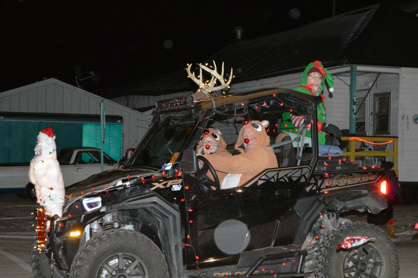 An entry in the Leaf River Lighted Christmas Parade drives down Main Street in the village on Dec. 17. A meet-and-greet with Santa and Mrs. Claus followed the parade, which was part of Leaf River's Christmas festival.