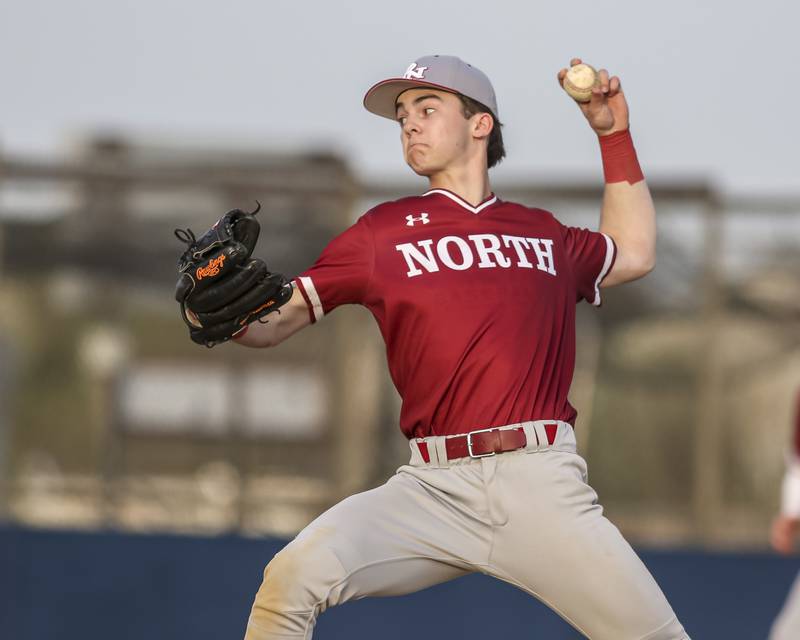 Plainfield North's Johnny Andretch (2) delivers a pitch during baseball game between Plainfield North at Oswego, Thursday, April 24, 2025 in Oswego.