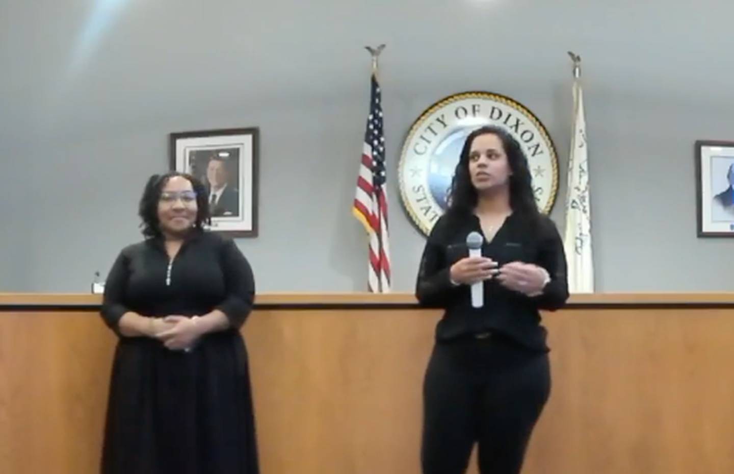 Jasmine Siddiqui (right) speaks to the crowd as Cecily White looks on as the two are named recipients of the Ike Mercer Certificate of Achievement Award on Tuesday, Feb. 20, at Dixon City Hall.
