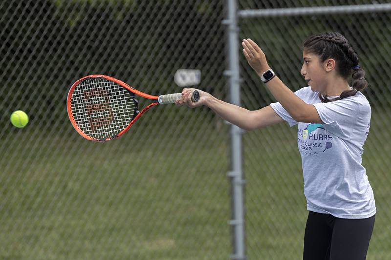 Fareeda Alkhalaf returns a shot during a doubles match Thursday, July 27, 2023 at the Emma Hubbs Tennis Classic in Dixon.