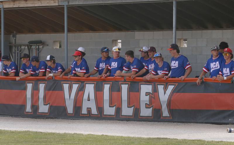 Members of the blue team stand in the dugout during the ICA Senior Baseball All Star Game on Monday, June 30, 2025 at Schweickert Stadium in Peru.