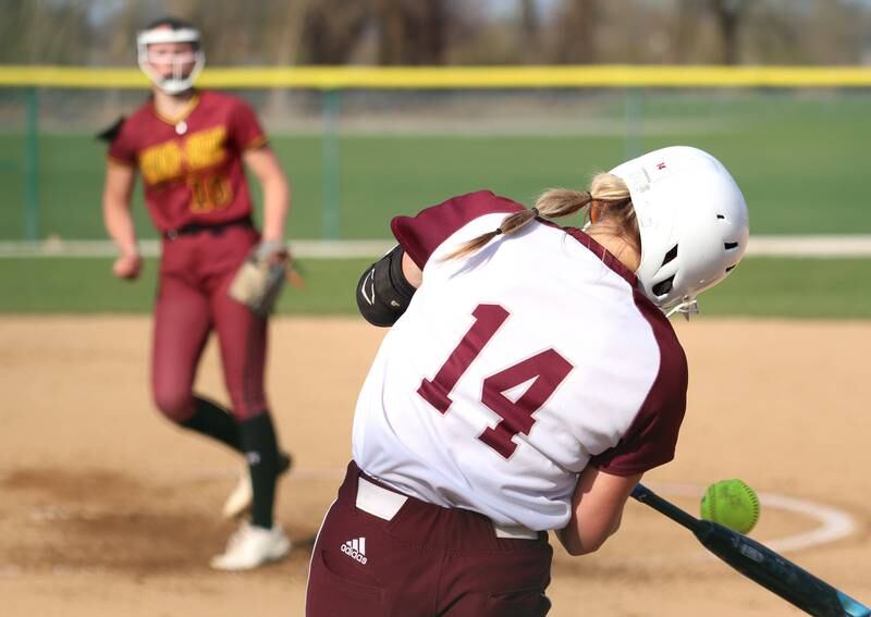 Marengo’s Kylee Jensen connects for a home run off of Richmond-Burton’s Hailey Holtz in varsity softball on Tuesday, April 22, 2025, at Marengo High School in Marengo.