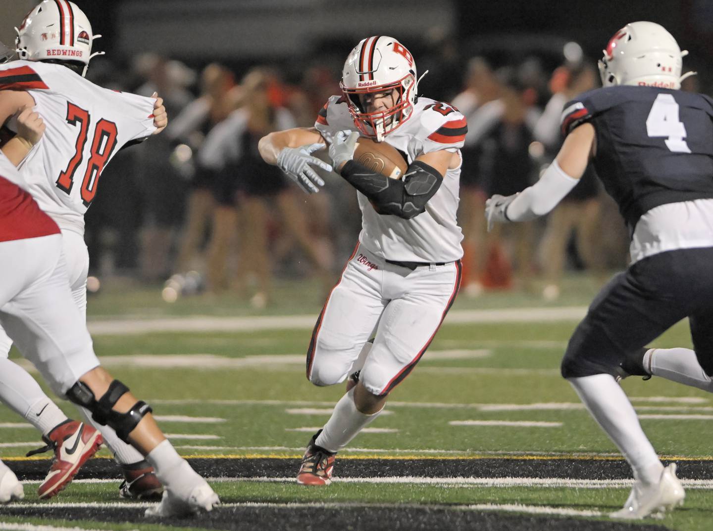 Benet Academy’s Joe Salvino finds a hole against Saint Viator in a football game in Arlington Heights on Friday, Sept. 19, 2025.