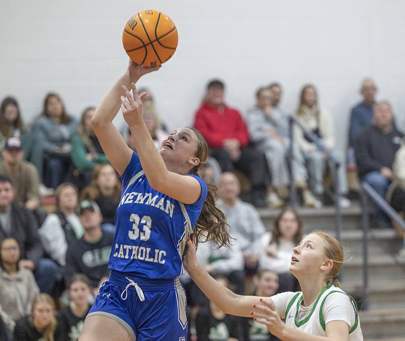 Newman’s Veronica Haley puts in a basket against Alleman Friday, Dec. 26, 2025, at the Duchesses Basketball Christmas Classic.