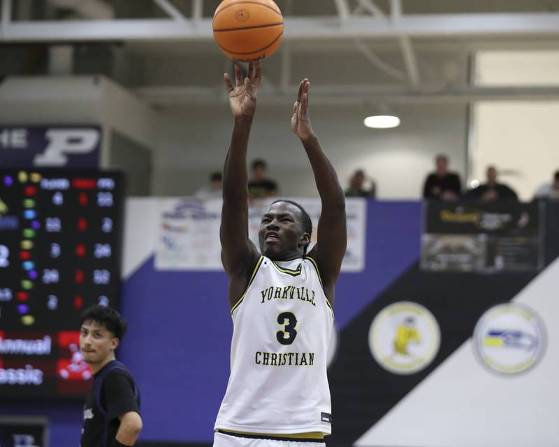 Yorkville Christian's Jayden Riley (3) shoots a free throw during their Plano Christmas Classic semi-final basketball game between Yorkville Christian at Plano Monday, Dec 29, 2025 in Plano.