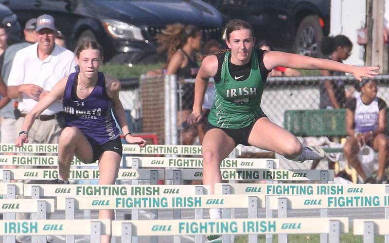 Wilmington's Madisen Van Duyne and Seneca's Elsa Douglas compete in the 100 meter hurdles during the Class 1A Sectional track meet on Thursday, May 15, 2025 at Seneca High School.