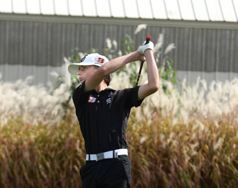 Byron's Lucca Talbert watches one of his drives during the 1A Pearl City Regional on Wednesday, Oct. 1, 2025 at Wolf Hollow Golf Course in Lena.