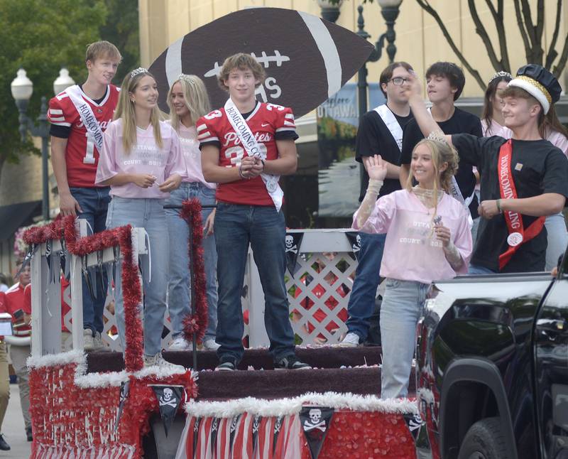 The The Ottawa Township High School  Homecoming Court waved and threw candy treats to those along LaSalle St in Ottawa Tuesday evening during the school’s Homecoming Parade.