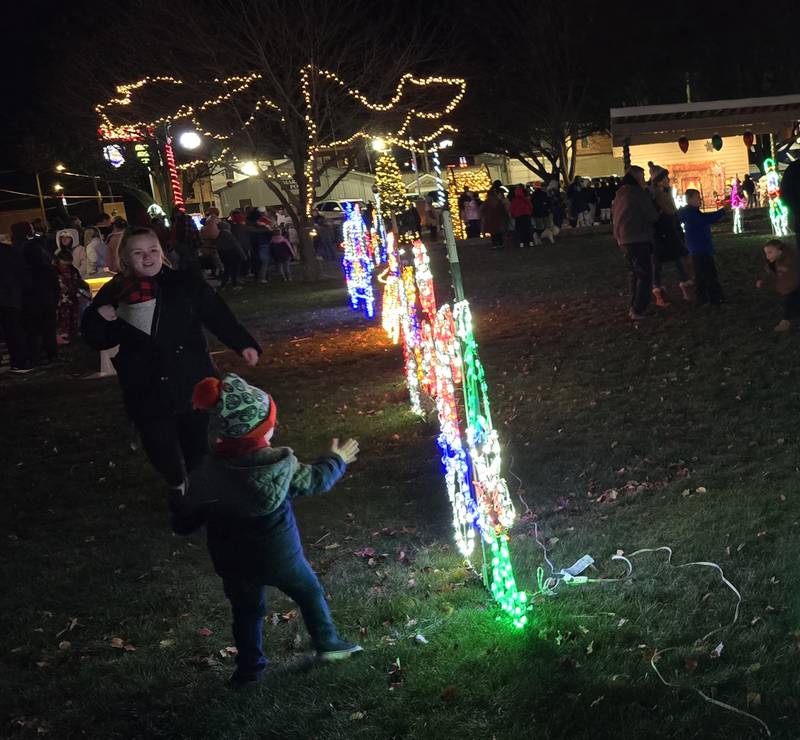 Families enjoy the lights Saturday, Dec. 7, 2024, at Knudson Park in Marseilles following the parade.