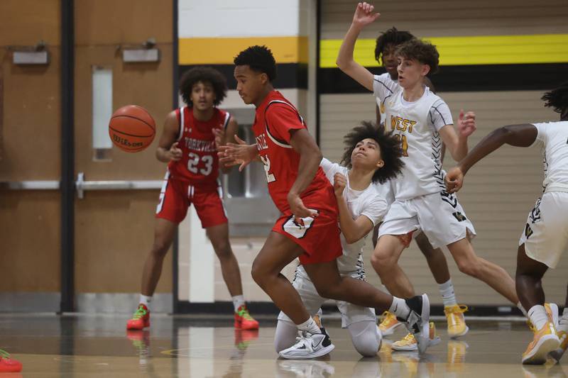 Joliet West’s Corey Nobles knocks the ball away from Yorkville’s Christian Harrell on Friday, Jan. 5th, 2024. in Joliet.