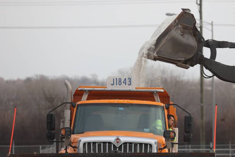 A truck is loaded with salt at the IDOT facility in Lockport.
