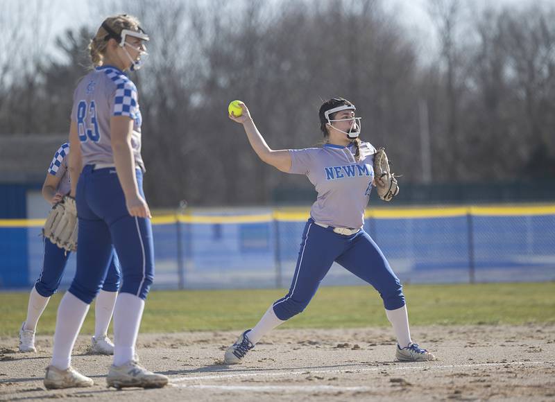 Newman’s Amiya Rodriguez fires the ball to first for an out against Forreston Monday, March 11, 2024.