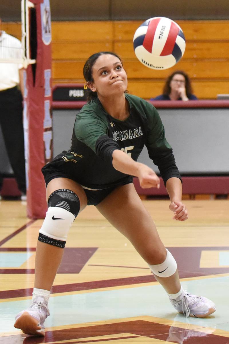 Bishop McNamara's Jersey Slone reaches for a dig during an All-City game at Kankakee Wednesday, Sept. 3, 2025.