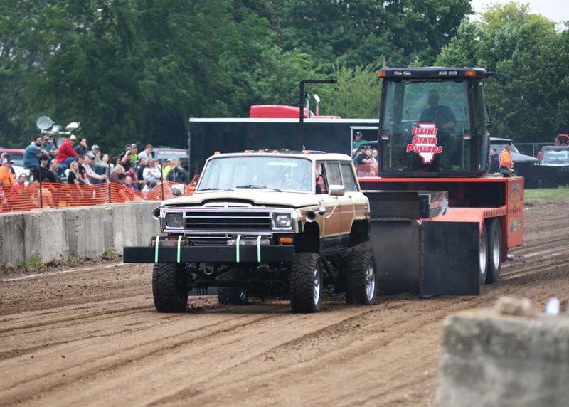 Trucks of different makes and models took part in the Forreston FFA Alumni Tractor and Truck Pull held during Leaf River Daze in Leaf River on Saturday, June 7, 2025. Here, Dillin Peppel of Whitewater, Wisconsin, makes his run in his modified 1988 Jeep Wagoneer.