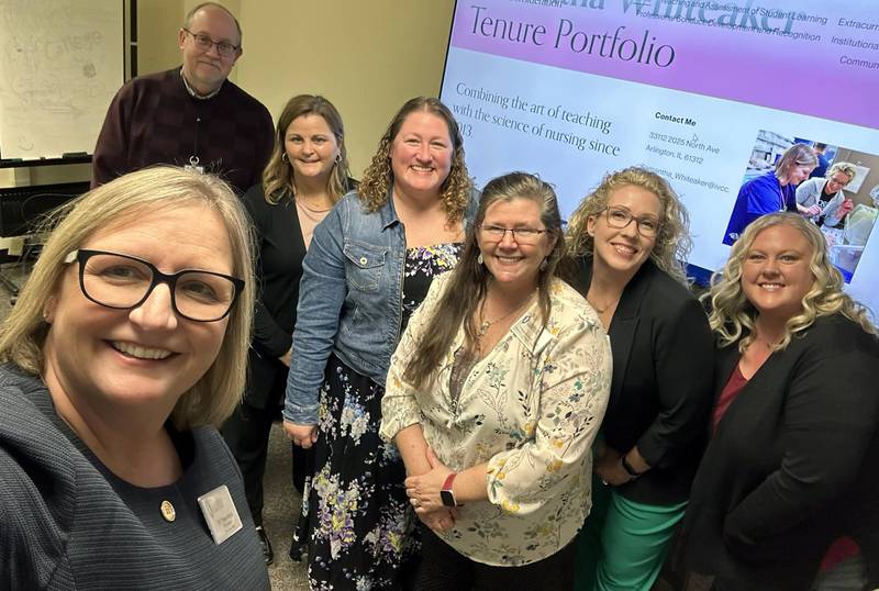 Faculty awarded tenure this spring join Illinois Valley Community College President Tracy Morris and Vice President for Academic Affairs Gary Roberts (both left) for a photo. Next to Roberts from left are Cathy Lenkaitis, Emily Morgan, Theresa Molln, Samantha Whiteaker and Chrissy Boughton.