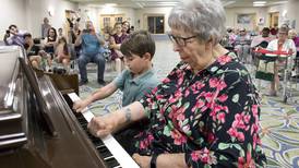 Shorewood senior and 6-year-old play piano duet at retirement community