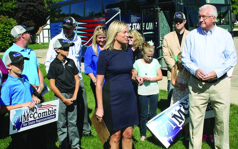 Morrison Mayor Everett Pannier (right) welcomes fellow mayor and 71st District state representative candidate Tony McCombie and her entourage during her stop in Morrison on Saturday. McCombie and her family and friends continued on to Rock Falls, Sterling, Colona and Moline.