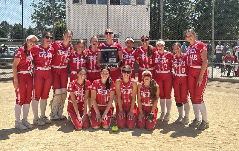 The Oregon High School softball team holds their regional plaque after beating Rock Falls 8-0  to win the championship of the 2A Oregon Regional on Saturday, May 23, 2026 at Oregon Park West.
