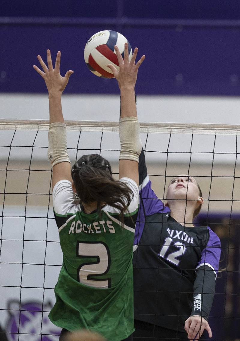 Dixon’s Izzy Queckboerner goes up for a hit against Rock Falls’ Kaltrina Lecaj Thursday, Sept. 18, 2025.