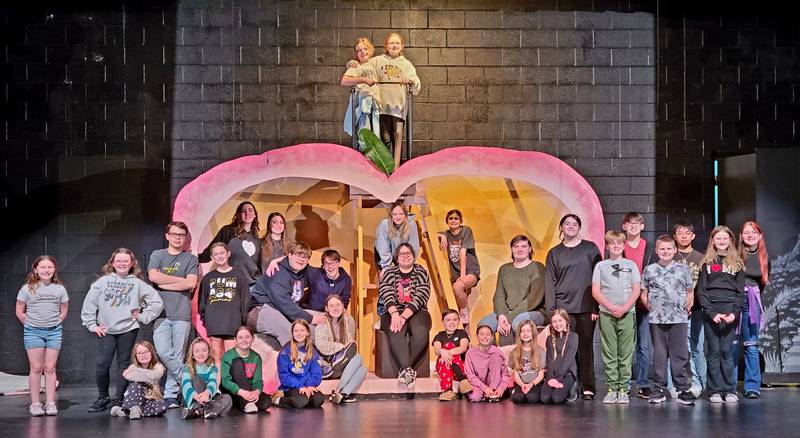 Putnam County students will perform "James the Giant Peach." The cast includes (front, from left) Lily Margis, Lilly Askeland, Colette Gapinski, Reagan Doehling, Maizy Urnikis, Giada Wright and Harper Heuser, (second, from left) Bella Godina, Phaelynne Messick, Ryan Oliver, and Madalyn Holst, (right of peach) TJ Kramarsic, Levi Nicoli, and AJ Lewis, (third row, from left) Makenna Goulding, Seth Saepharn, Roberth Ruiz and Payton Smith. Inside the peach (seated from left) Anna Sandberg, Eric Vipond, Nolan Bence, Nora Bertalot, Knox Hopkins and Garret Luke, (inside the peach standing) Phoebe Kammer, Lisa Myres, Diana Ely, Kynzie Thomas, (top of the peach) Penelope Bird and Reese Lenkaitis.