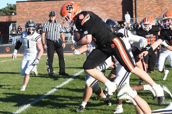 Byron defense quiets IC Catholic’s aerial attack, Tigers advance to Class 3A semis