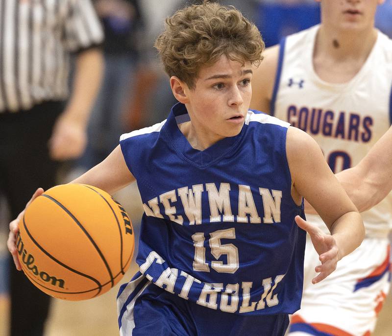 Newman’s Easton Coward drives to the lane against Eastland Tuesday, Dec. 10, 2024, at Eastland High School.