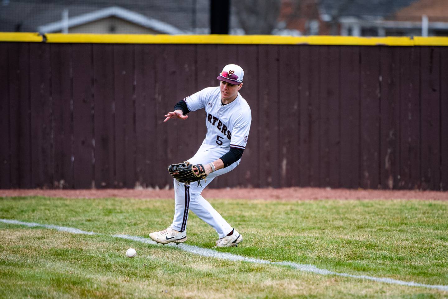 Lockport's Jake Moerman fields the ball during a game against Joliet Catholic on Friday, March 24, 2023, at Flink Field in Lockport.