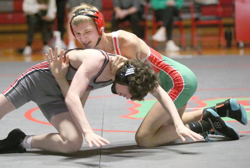 L-P's Austin Herron wrestles Ottawa's Austin Augle on Thursday, Jan. 9, 2025 in Sellett Gymnasium at L-P High School.