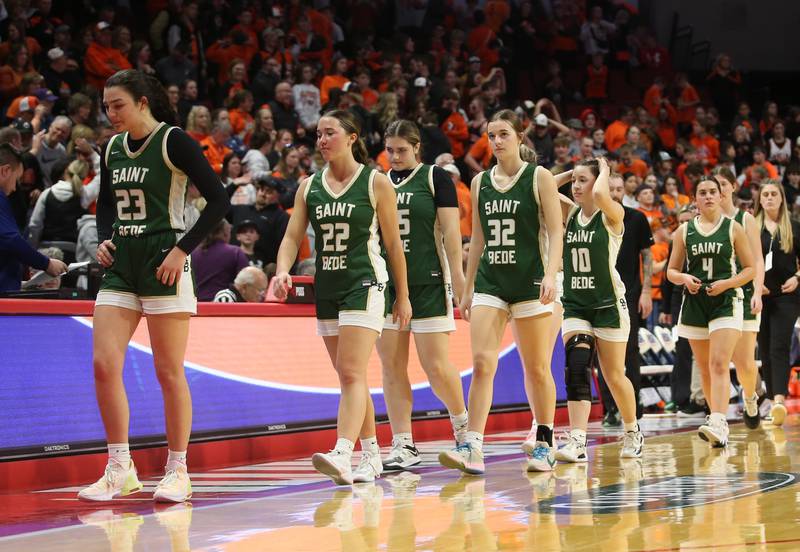 Members of the St. Bede girls basketball team walk off of the court after being defeated by Altamont during the Class 1A third-place game on Thursday, Feb. 29, 2024 at CEFCU Arena in Normal.