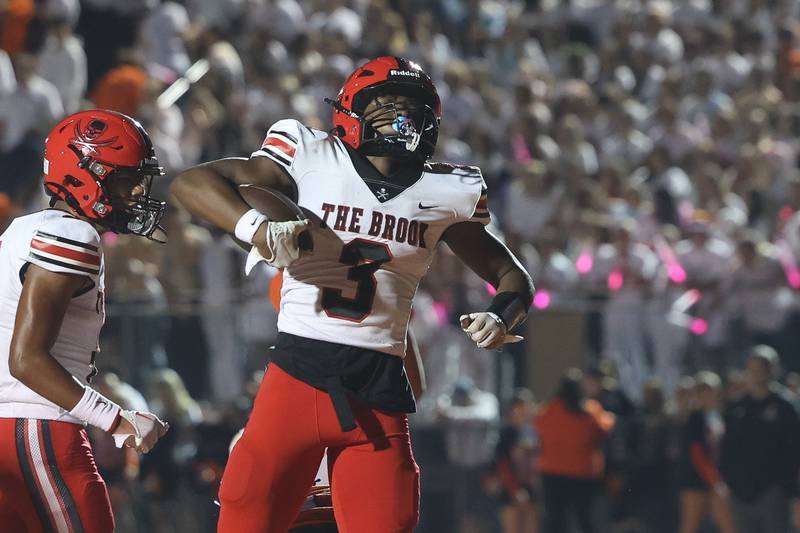 Bolingbrook’s Chico Thomas celebrates a touchdown catch against Lincoln-Way West on Friday, Sept. 22 in New Lenox.