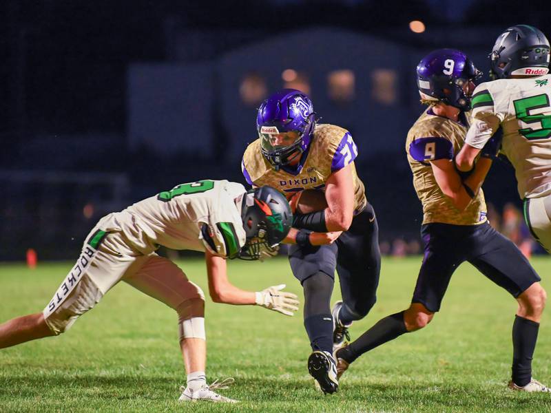 Dixon's Aiden Wiseman runs the ball on Friday, Sept. 8, 2023 at Rock Falls.