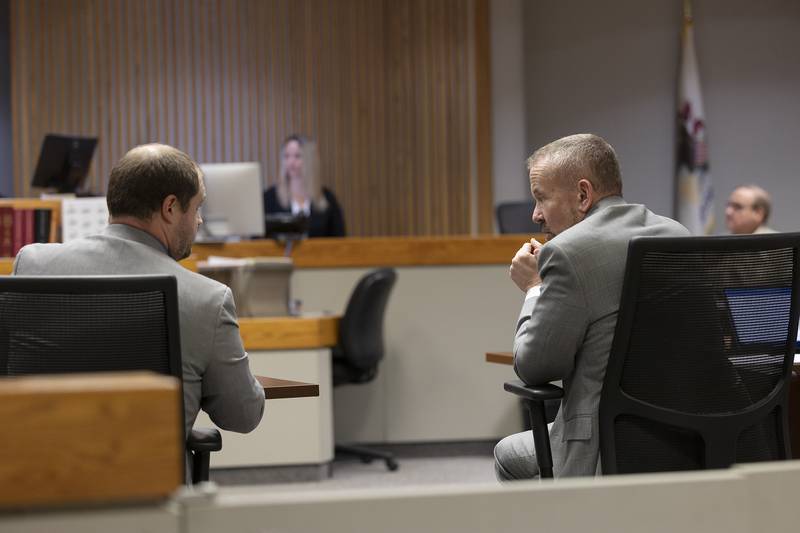 Whiteside County Assistant State's Attorney Ryan Simon (left) and defense attorney Jim Mertes speak during a hearing for Kyle Cooper on Friday, April 4, 2025, at the Whiteside County Courthouse in Morrison.