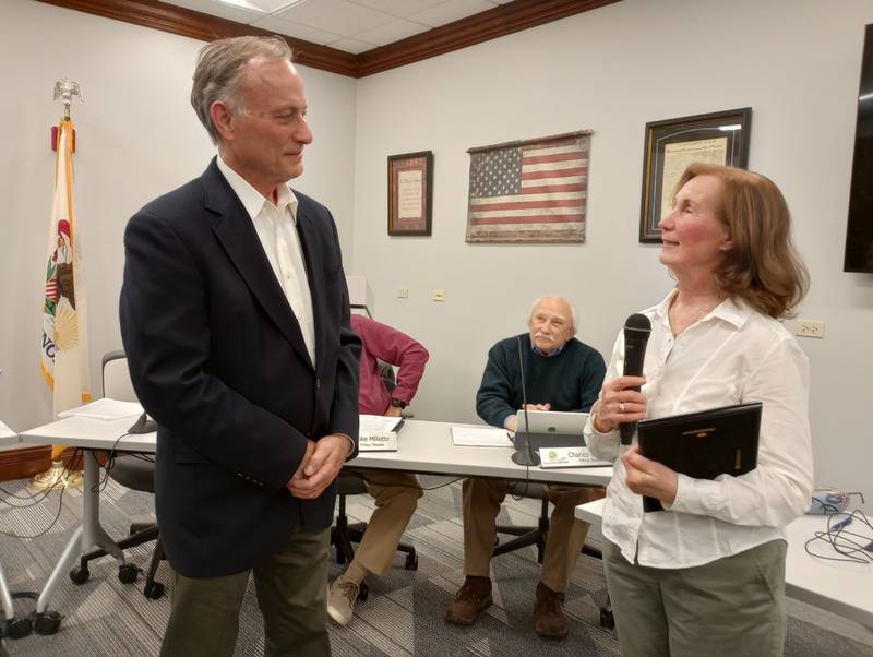 Outgoing Campton Hills president Michael Tyrrell receives a plaque and thanks from incoming Village President Barbara Wojnicki at the May 2, 2023 Village Board meeting.