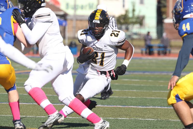 Joliet West’s Jovon Johnson cuts to a hole against Joliet Central on Saturday.