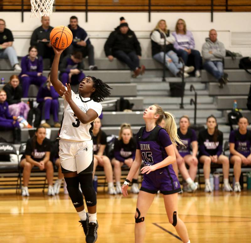 Kaneland’s Amani Meeks gets the ball to the basket during a game against Dixon on Monday, Dec. 2, 2024 in Maple Park.