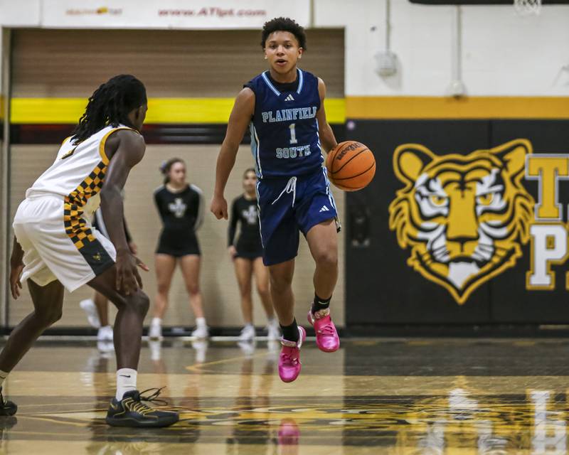 Plainfield South's Ayden Foston (1) advances the ball during their basketball game between Plainfield South at Joliet West, Feb 2, 2026 in Joliet.