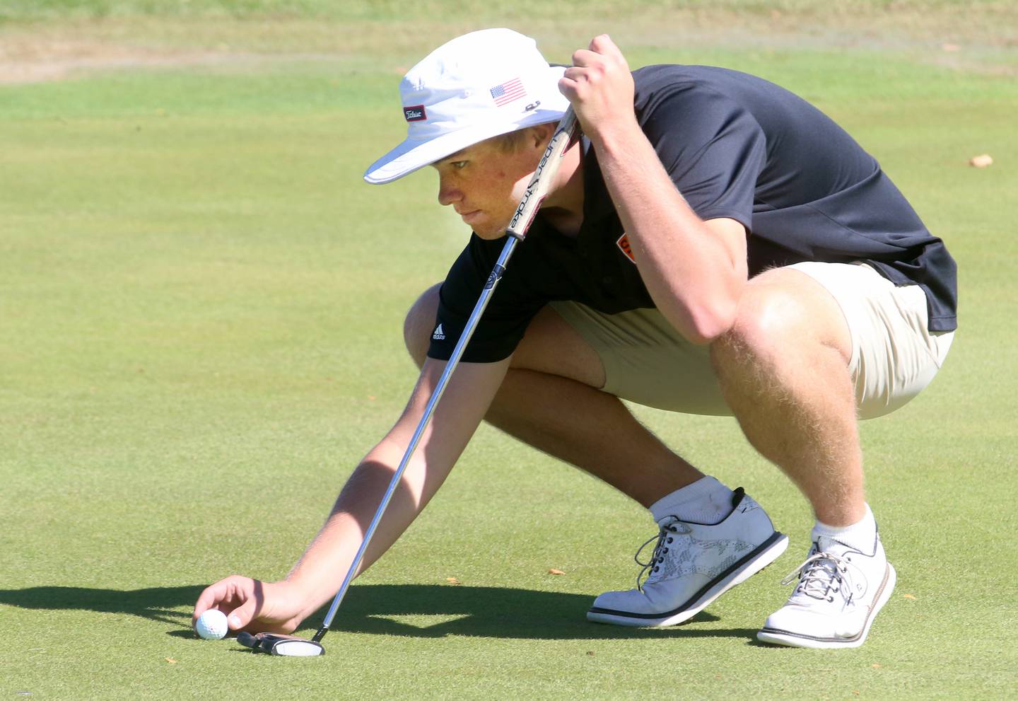 Sandwich's Noah Campbell lines up a putt on the 10th hole during the Class 2A Regional golf meet on Wednesday, Oct. 2, 2024 at Senica's Oak Ridge Golf Club in La Salle.