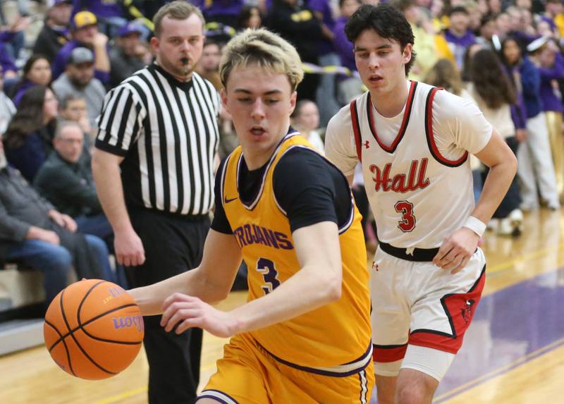 Mendota's Alex Beetz gets around Hall's Noah Plym on Tuesday, Feb. 3, 2026 at Mendota High School.