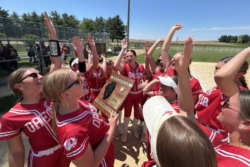 Members of the Oregon High School softball team celebrate after beating Rock Falls 8-0 in the championship game of the 2A Oregon Regional on Saturday, May 23, 2026 at Oregon Park West.