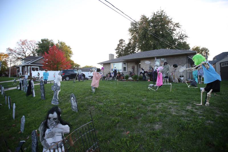 This home has dozens of scarecrows doing different things in the 1500 block of West Street on Wednesday, Oct. 18, 2023 in Peru.