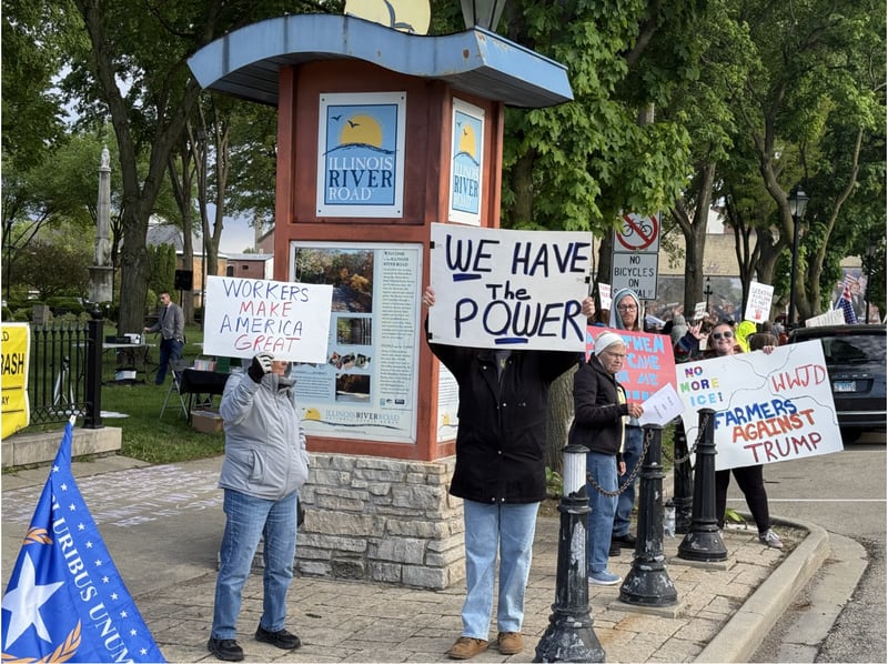 Protestors gathered as part of a nationwide "May Day Rally" on Friday, May 1 at Washington Square Park in Ottawa.