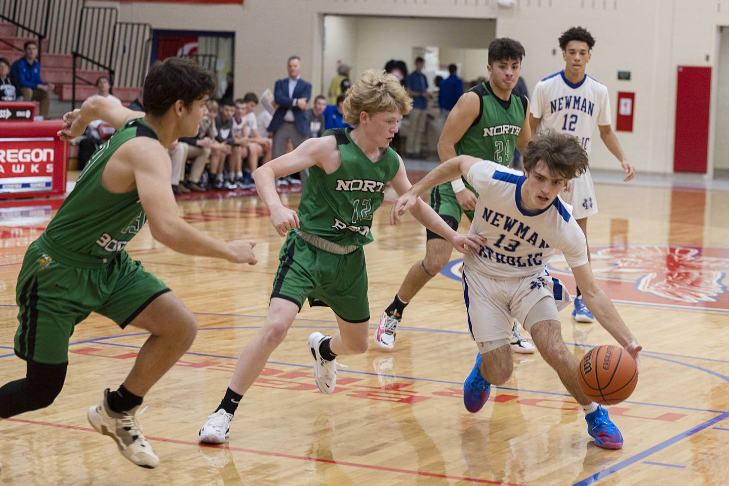 Newman's Nolan Britt handles the ball Monday, Nov. 21, 2022 while playing North Boone in the Oregon Thanksgiving Tournament.