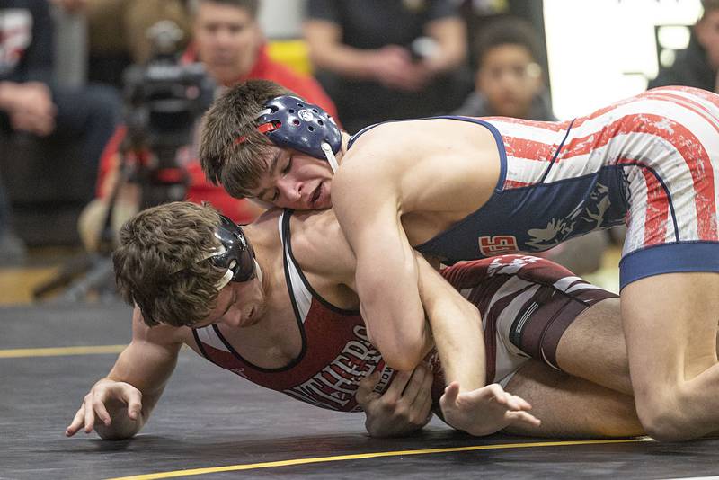 Morrison’s Caleb Modglin (top) works on Erie’s Tristan Hovey in the 150 pound finals Saturday, Jan. 31, 2026, during the Class 1A Wrestling Regionals at Riverdale High School. Modglin won 9-6.