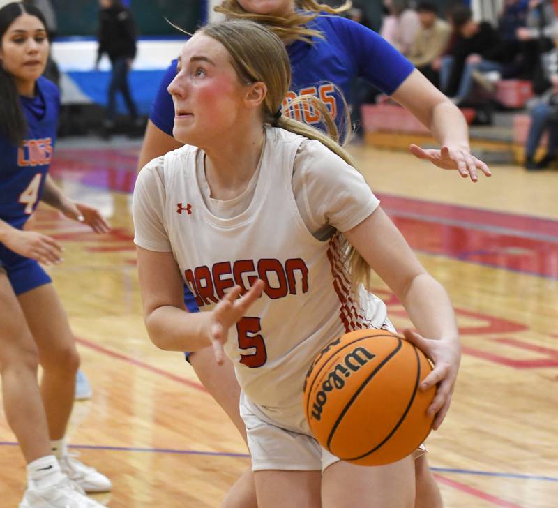 Oregon's Shaylee Davis drives to the basket against Genoa-Kingston on Friday, Jan. 30, 2026 at the Blackhawk Center.