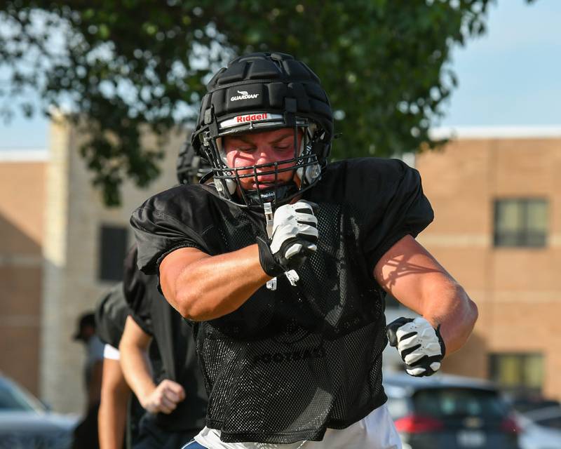 Jake Buckley of Kaneland runs some drills before a joint practice with Oswego High School on Thursday July 10, 2025, held at Oswego High School.