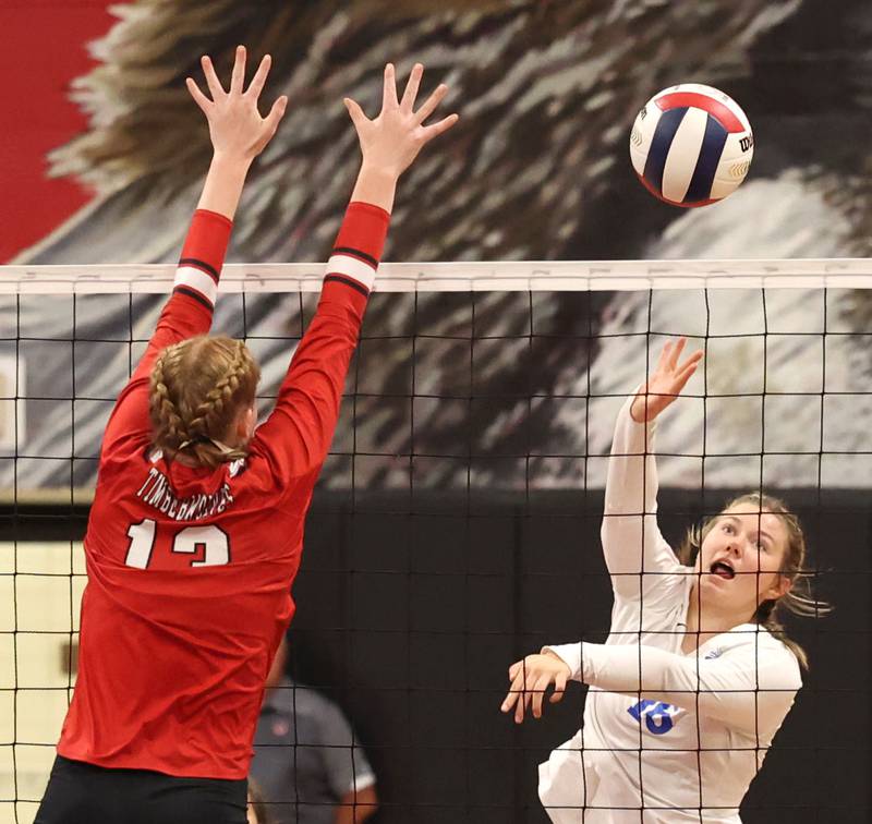 Hinckley-Big Rock's Grace Barrett tries to tip the ball past Indian Creek's Allie Peterson during their match Tuesday, Sept. 19, 2023, at Indian Creek High School in Shabbona.